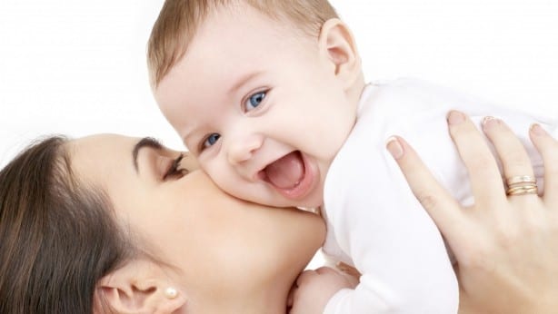 picture of happy mother with baby over white